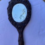 Miroir à main en bois sculpté de roses